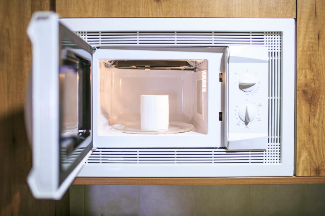an open white microwave